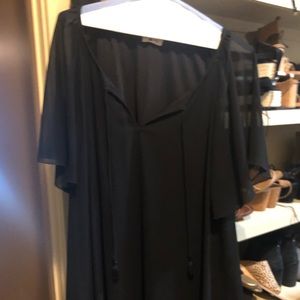 Black tunic with sheer sleeves